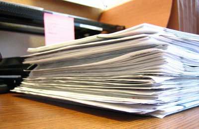 When NOT to Pay Your Bills stack of bills